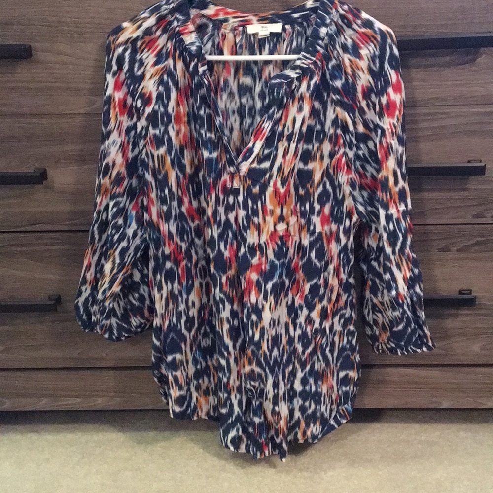 3/4 length sleeve blouse. Navy, oranges, white